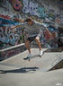 Full body view of the model wearing All-Over Print Unisex Athletic Long Shorts